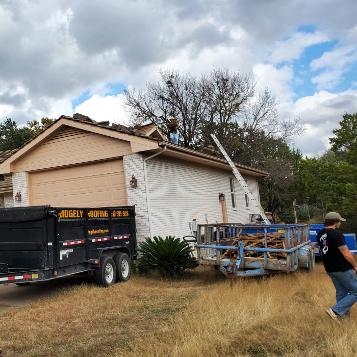 roofing company doing a roof replacement